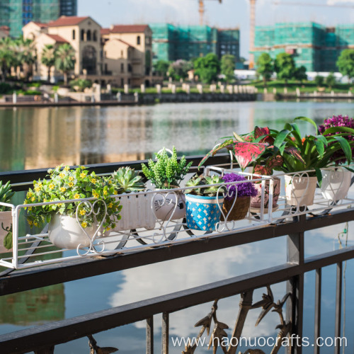 iron balcony railing flower stand